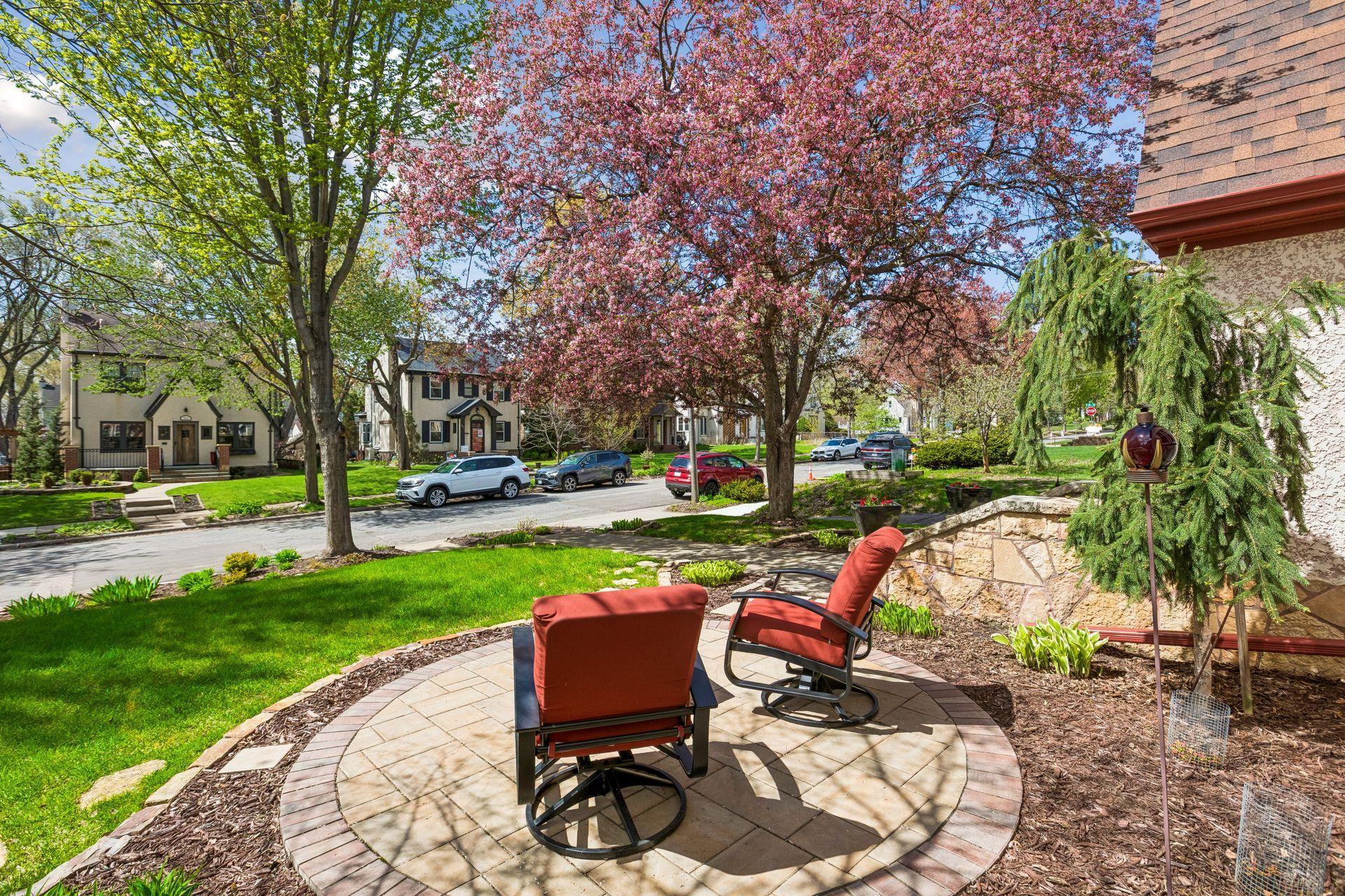 The round paver patio was added in 2020 and offers the perfect front yard views.