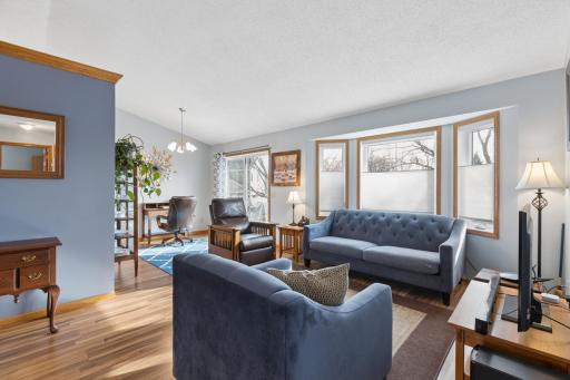 Another view of the upper level living room. Lots of light from the windows as well as the walkout to the deck.