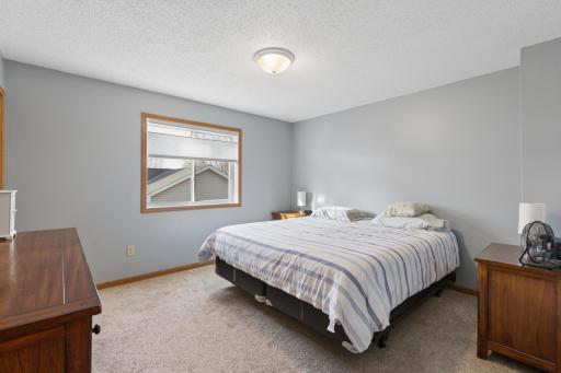 One of the 2 upper level bedrooms. There are 4 total bedrooms in this home! Nice!