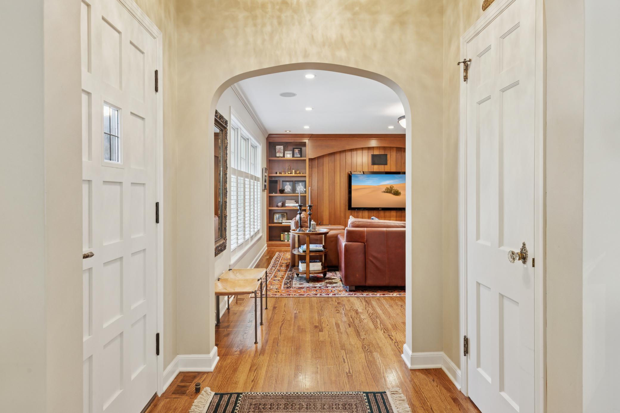 Gleaming hardwood floors throughout main and upper level