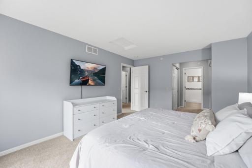 Primary is just across the hall from guest bedroom.
