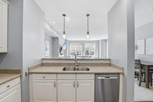 Recently installed kitchen faucet and updated lighting. Don't miss the Bosh dishwasher replaced in the last few years.