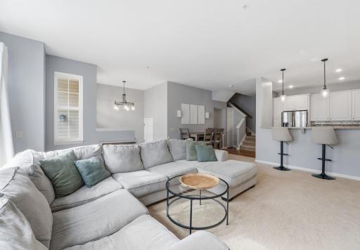 One room seamlessly flows into the next and big windows bring in tons of sunlight.