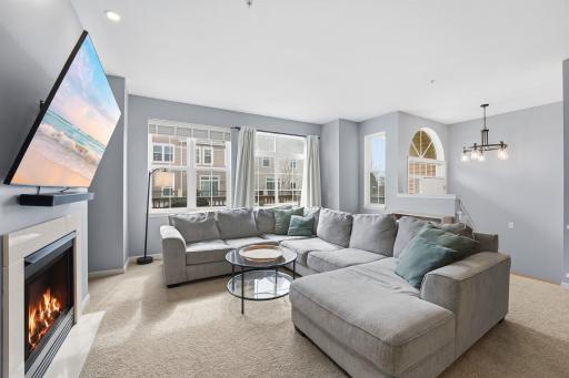 The sliding glass door off the living room leads out to a gorgeous deck, let's head out there!