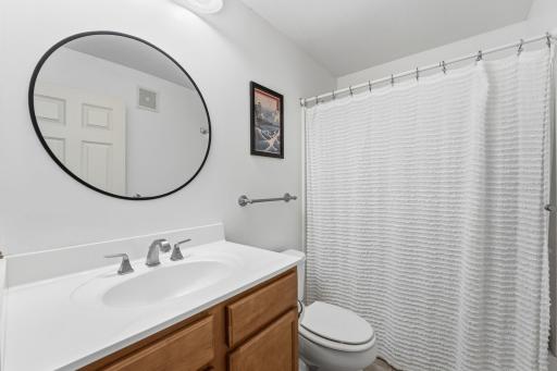 Full bathroom off the upstairs hallway. The primary suite has a 3/4 bath as well.