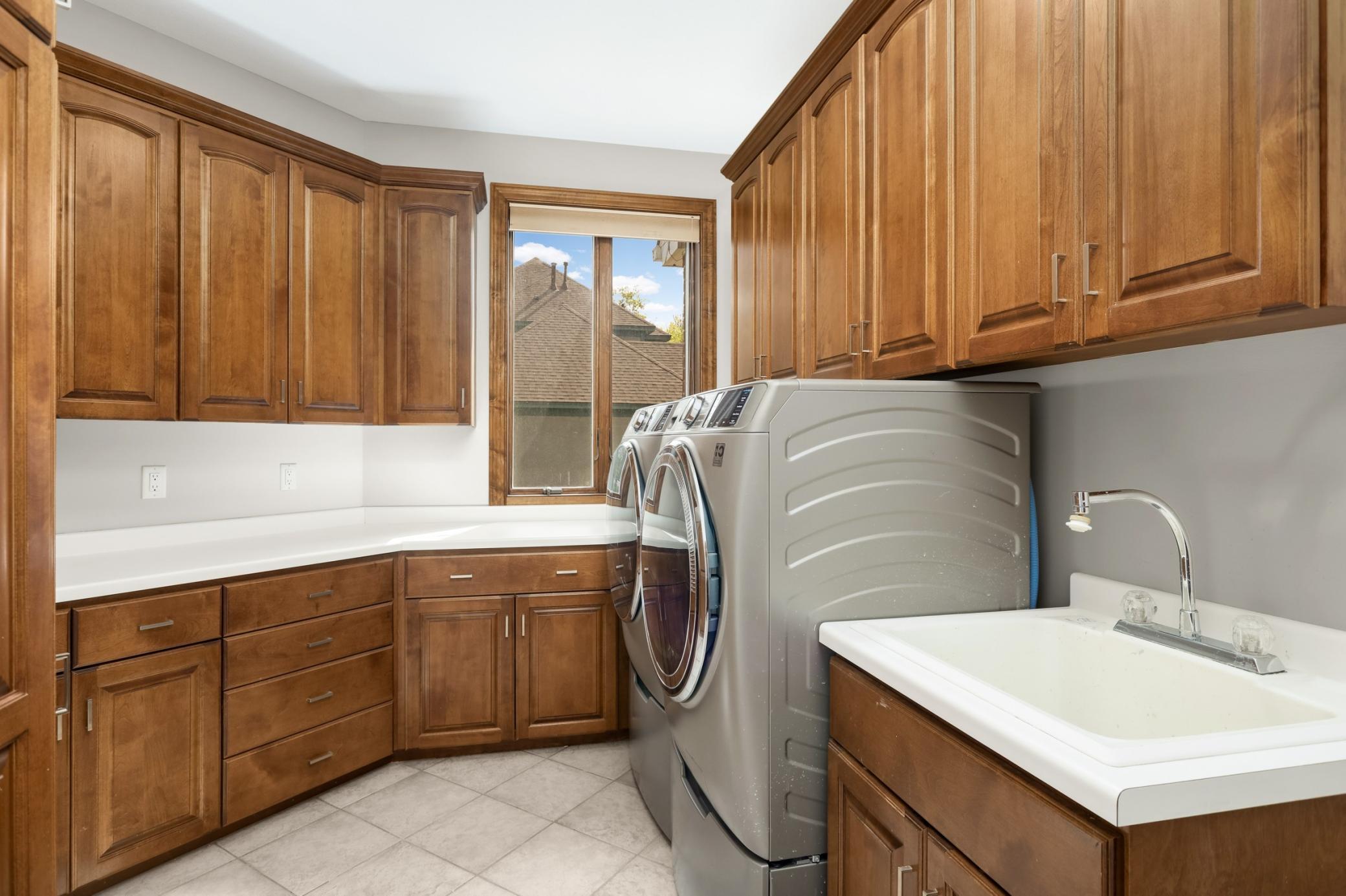 Dedicated laundry room with ample storage