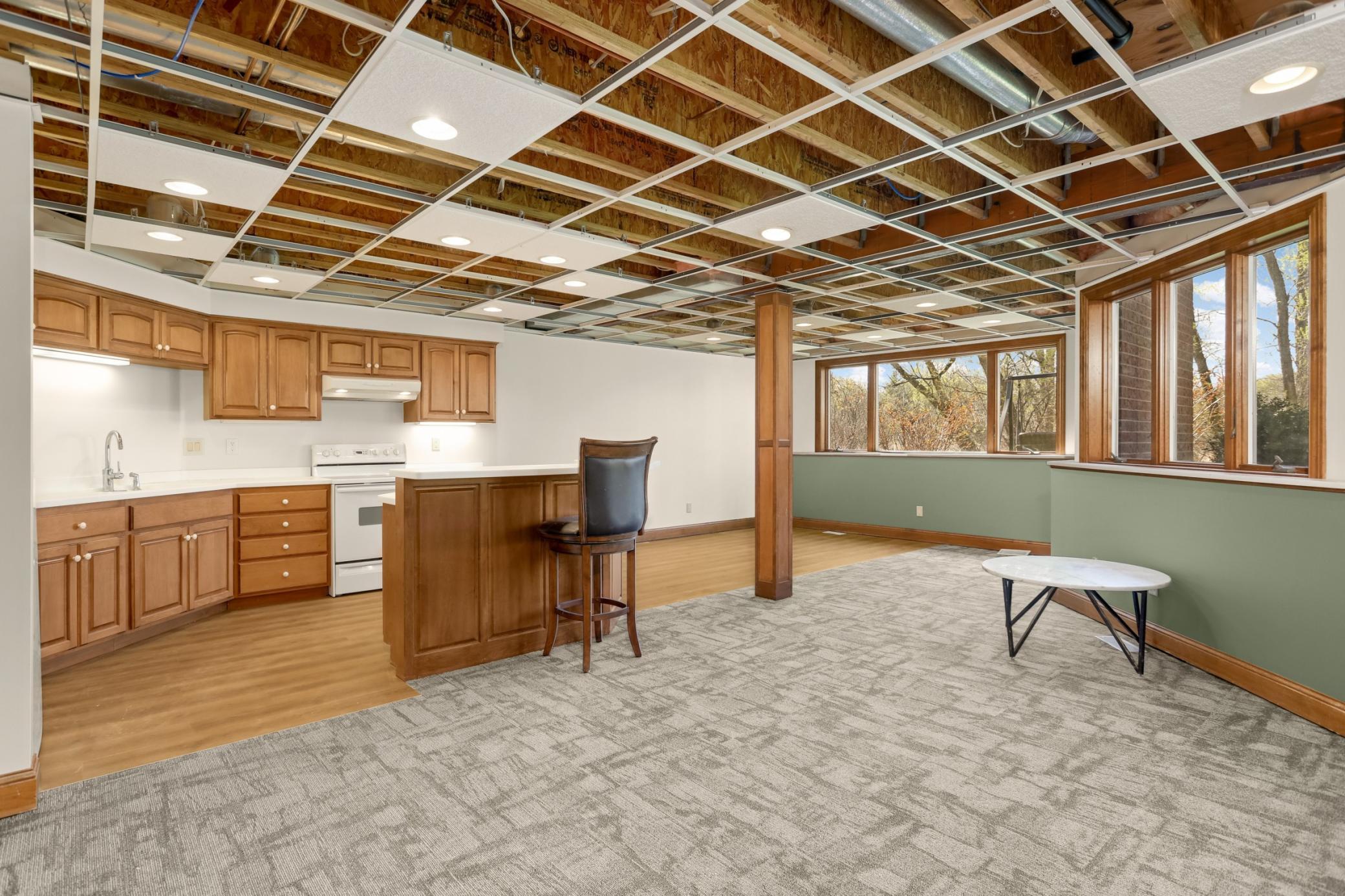 Unfinished lower-level ceiling = finish to your style with a seller credit