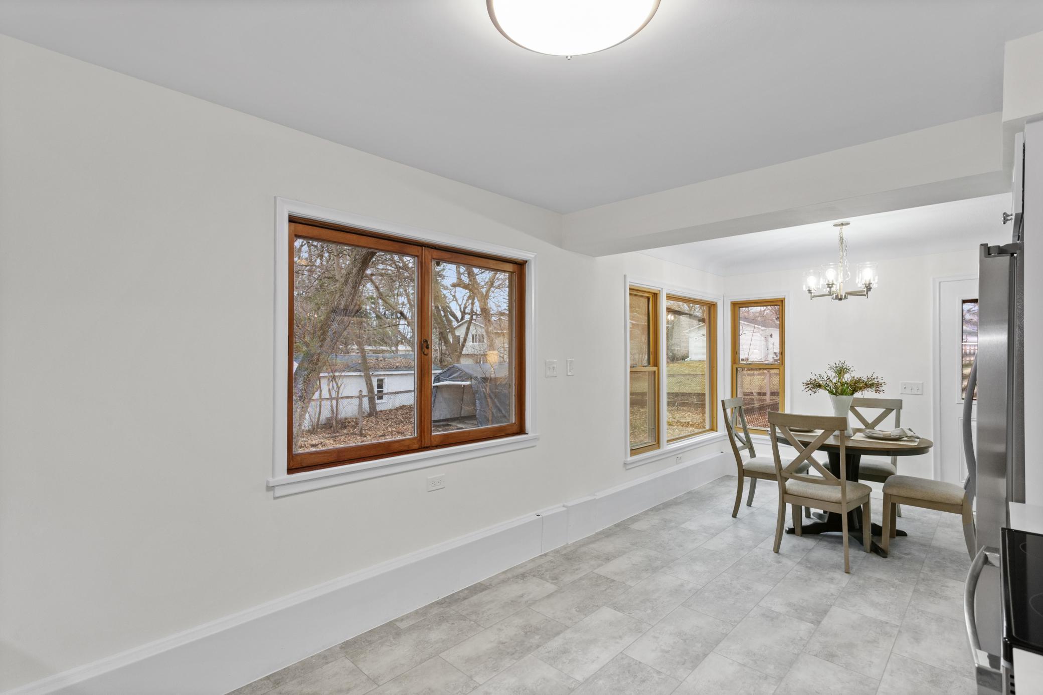Kitchen overlooks the backyard, perfect place for a breakfast table.
