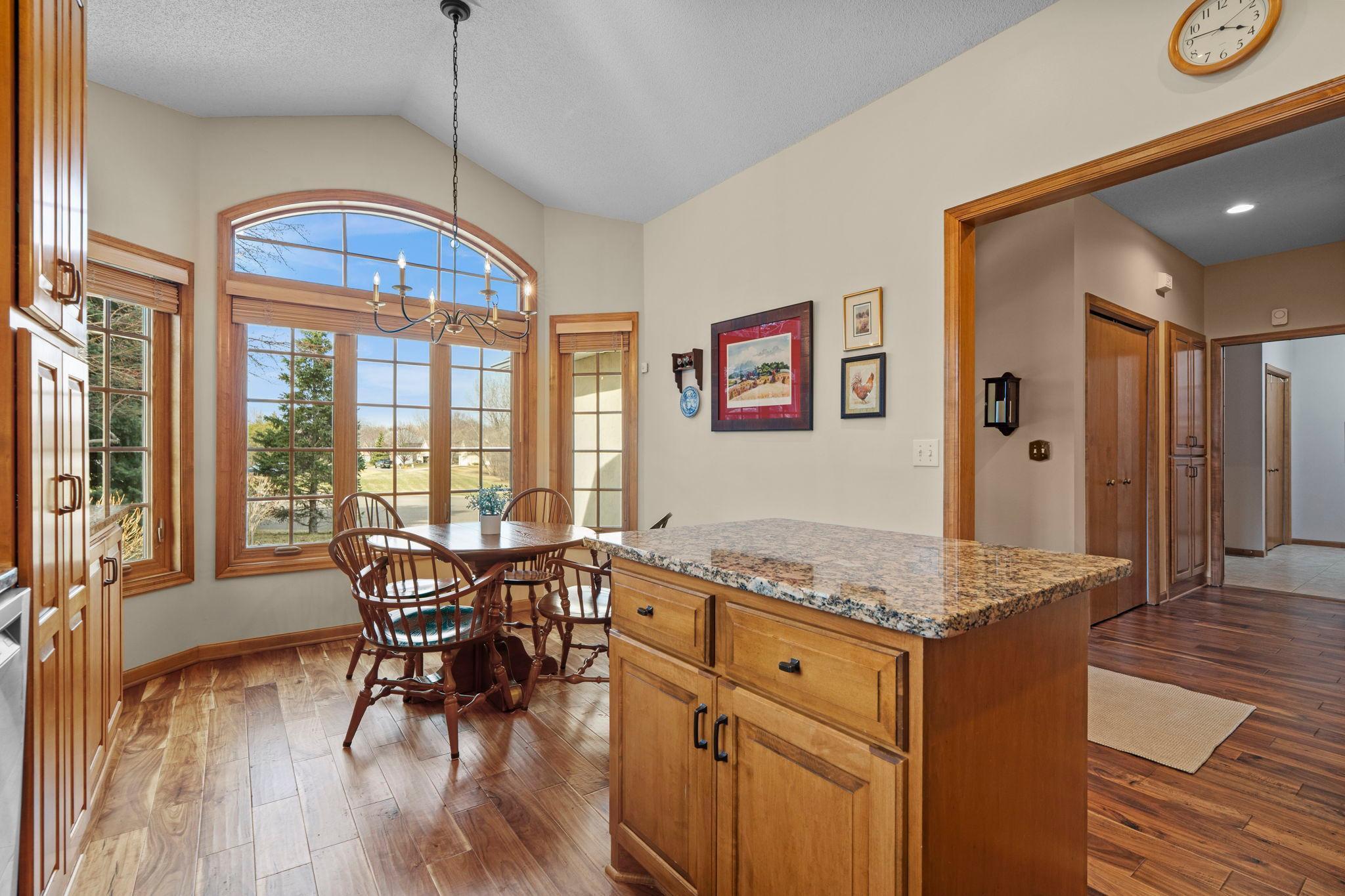 Just off the kitchen, the informal dining area includes a charming bay window overlooking the front yard.
