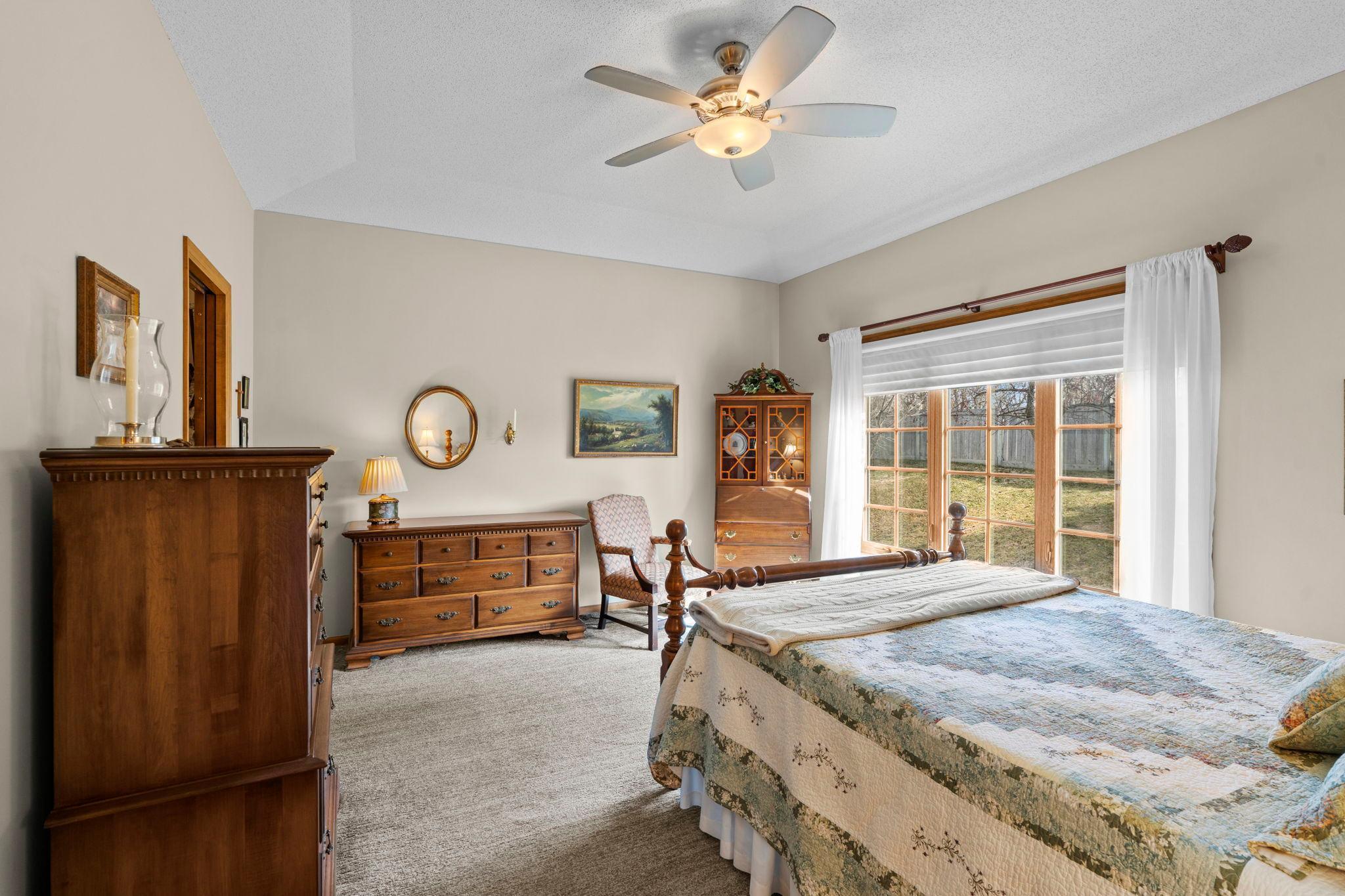 The primary suite offers generous space with a walk-in closet and a private ensuite.