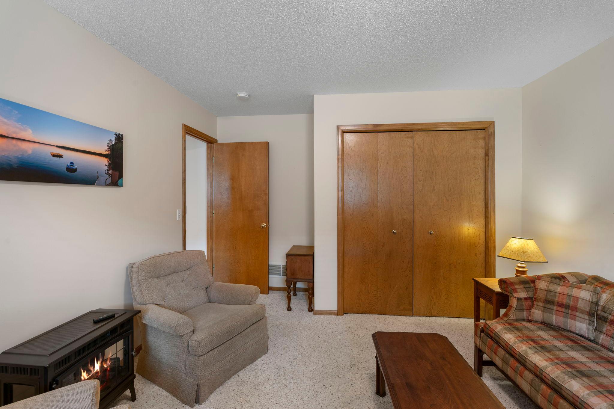 Two additional comfortable bedrooms are located on the lower level.