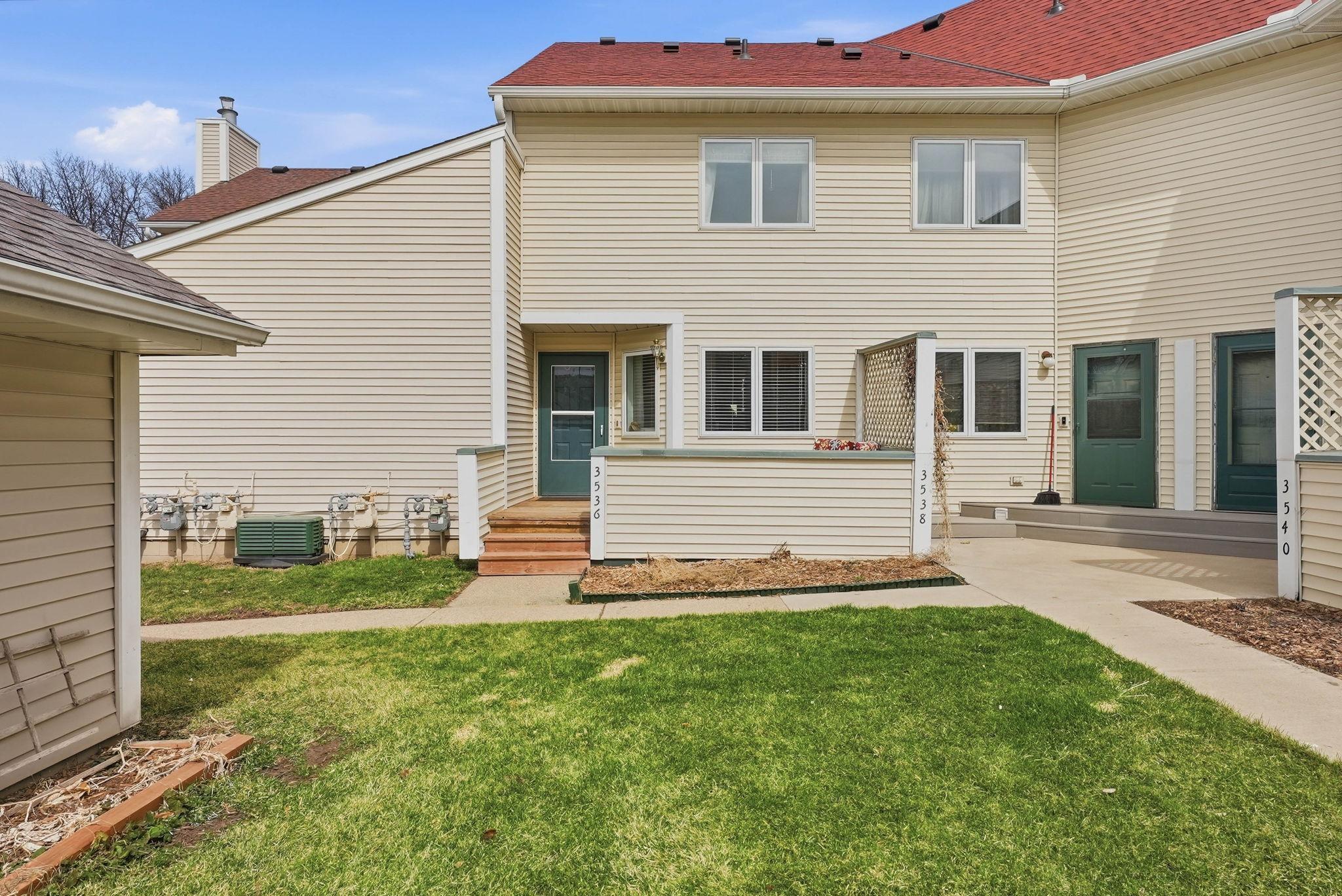Rear with garden bed for plants and grass play area
