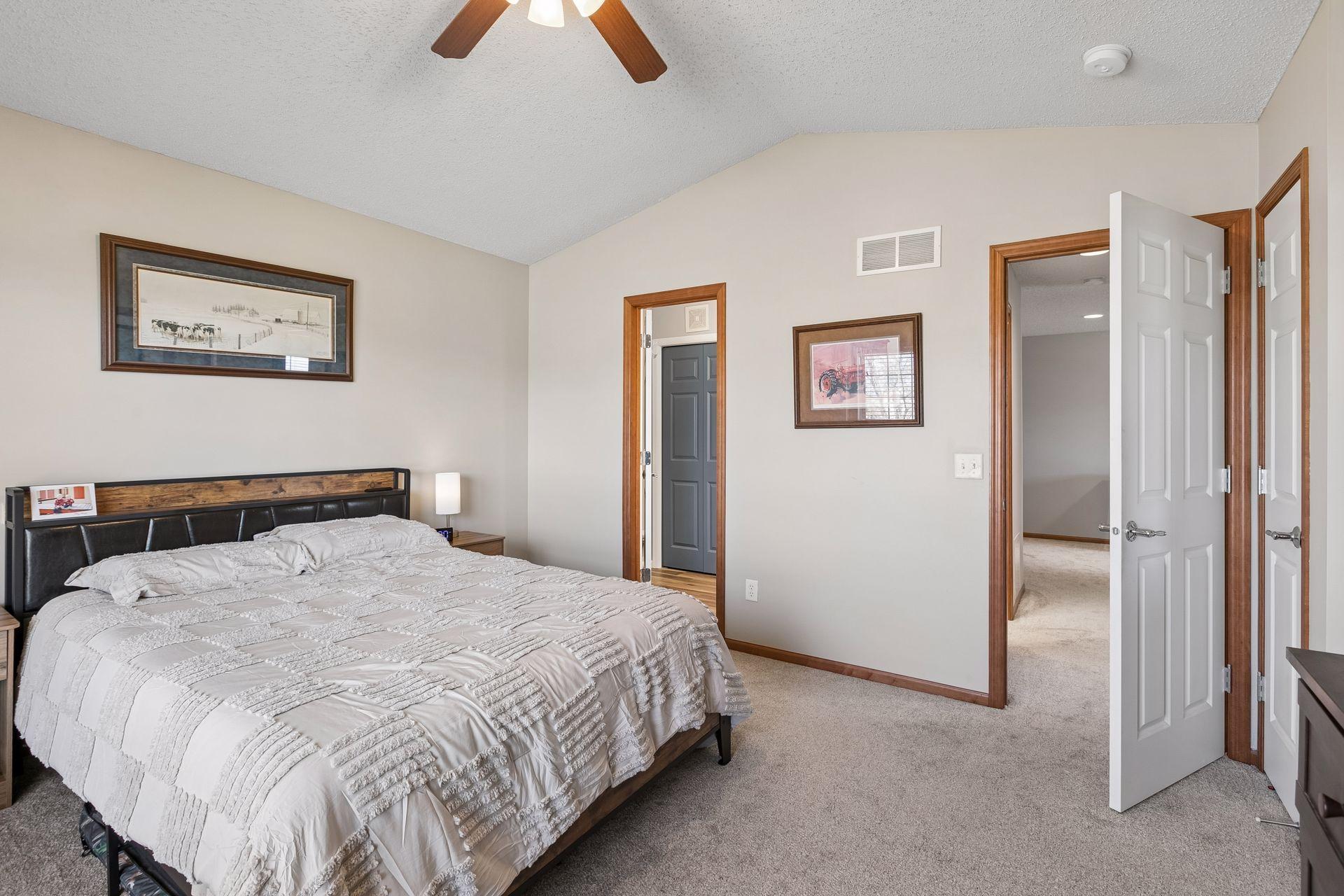 Primary bed has a walk through to the upper level full bath.