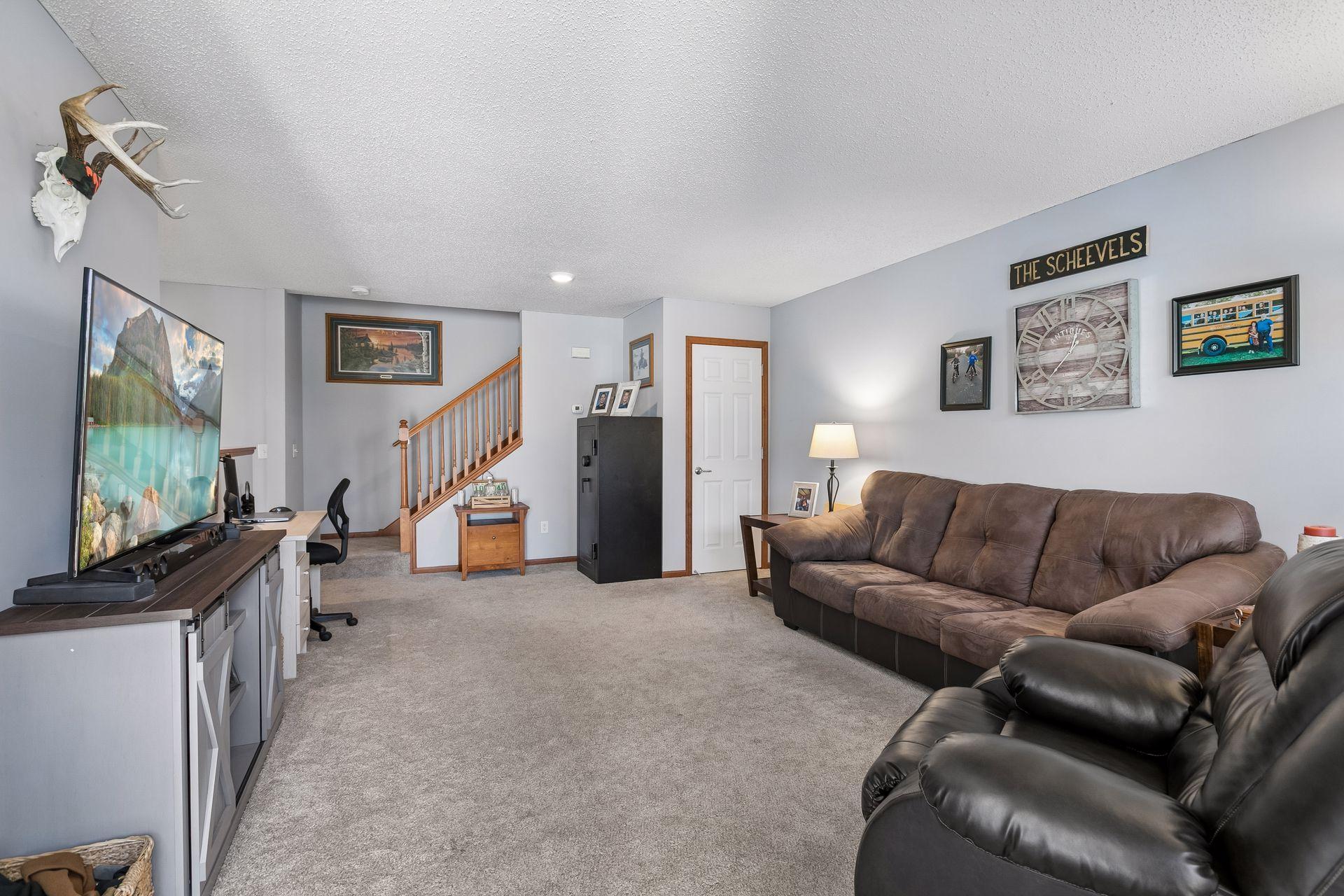 Spacious living room with with neutral colors.
