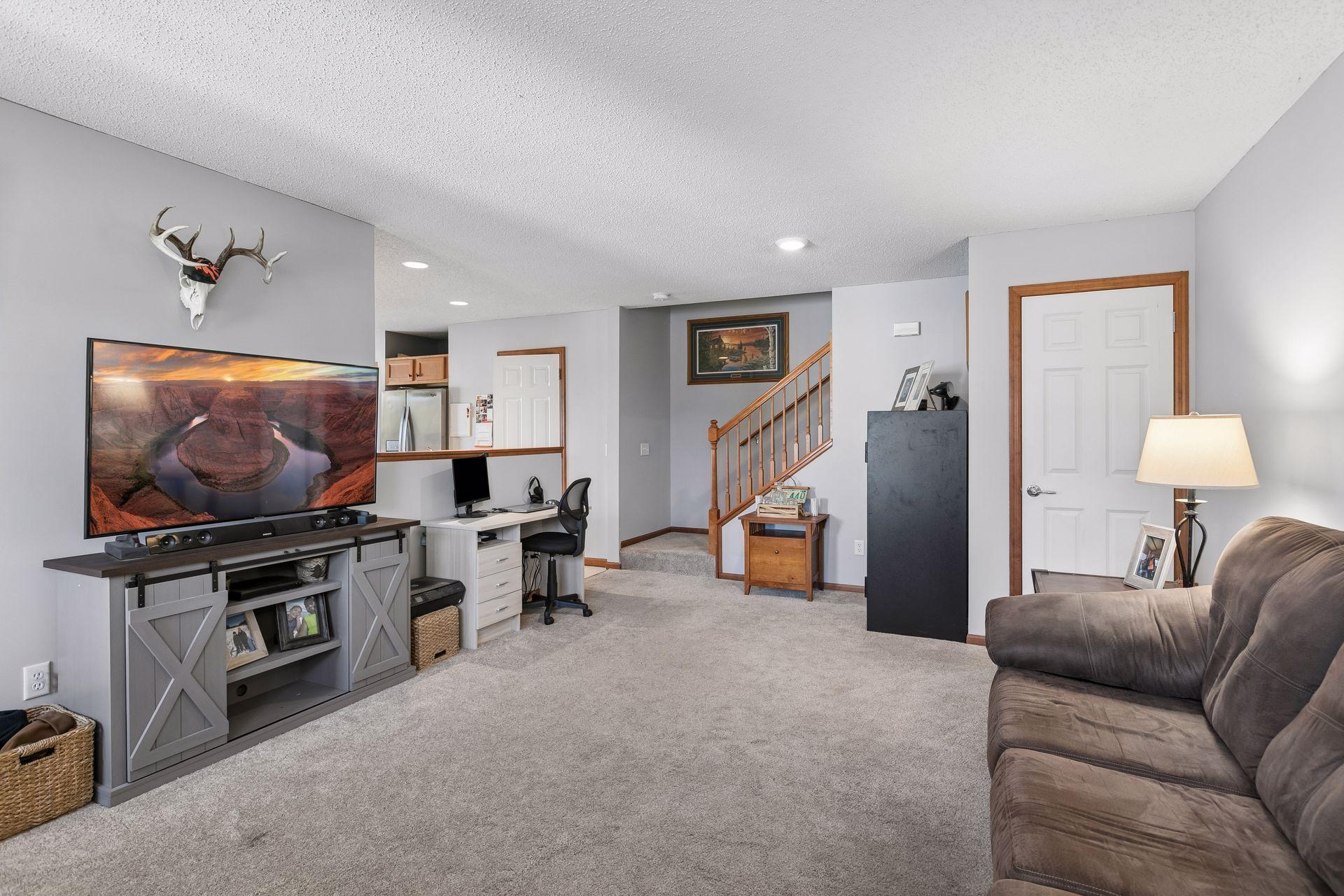 Plenty of space for a dining room table and convenient under step storage.