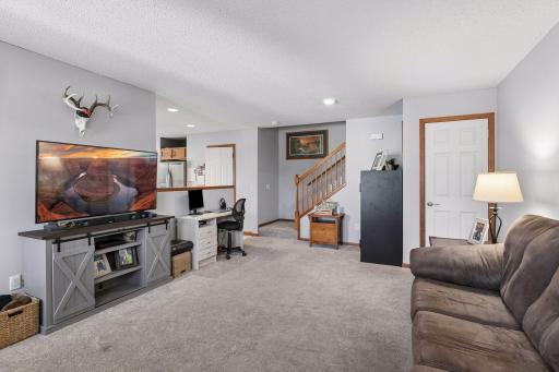 Plenty of space for a dining room table and convenient under step storage.