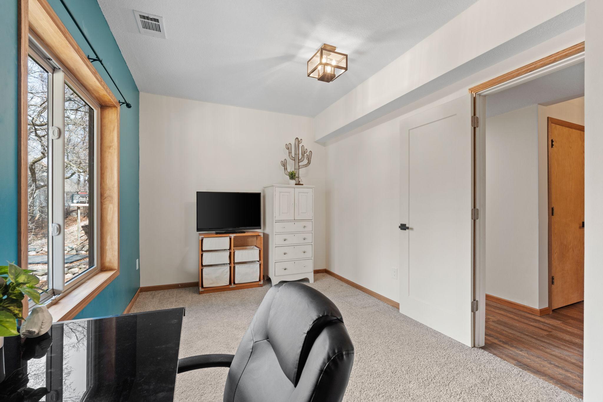 Bedroom #3 in the lower level currently used as an office space