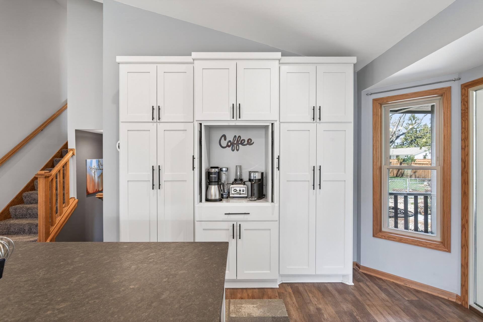 Lots of kitchen storage & a beverage station