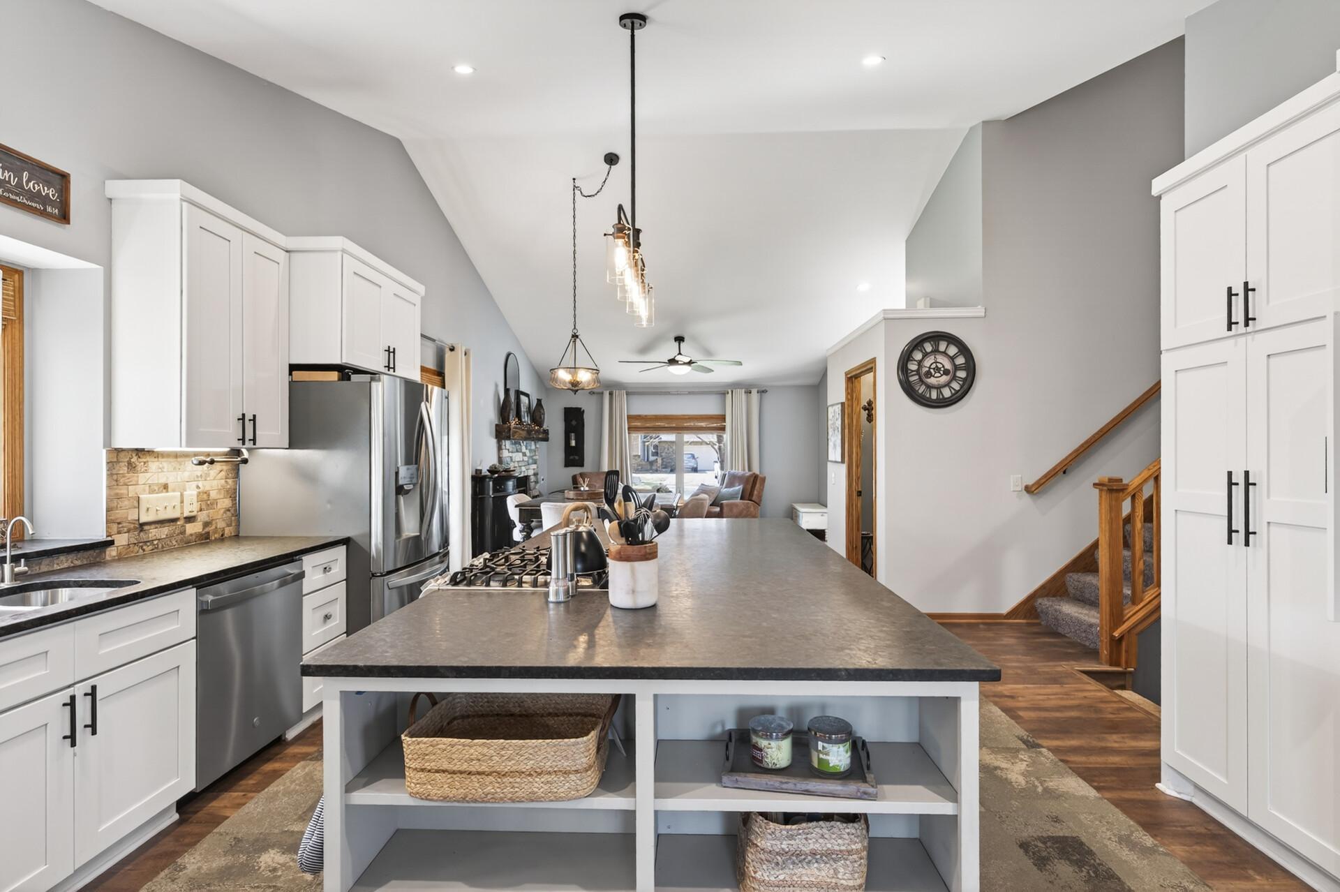 Open vaulted main level spaces are perfect for entertaining!