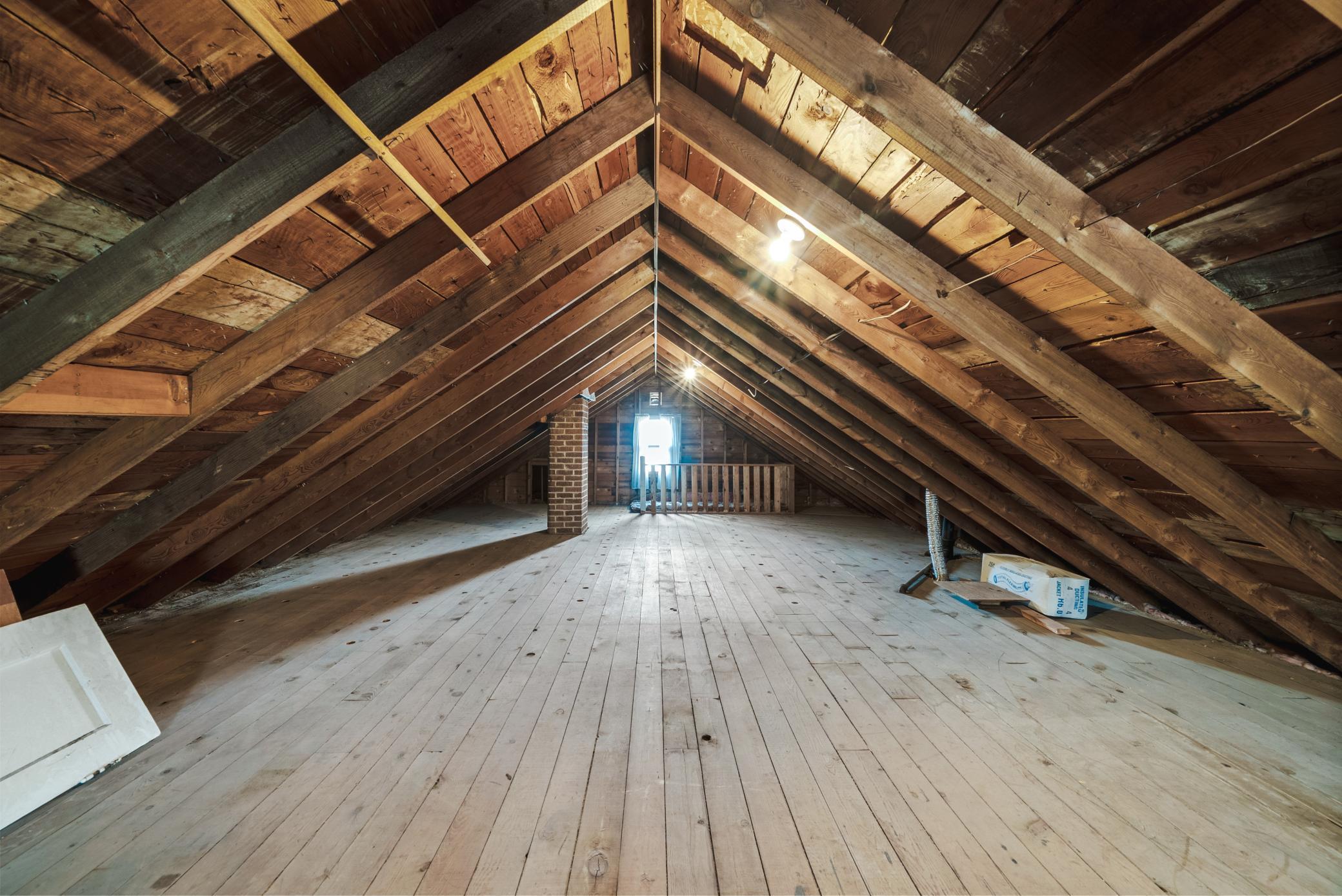 The walk-up attic offers incredible potential for future finished space, studio, or additional bedroom.