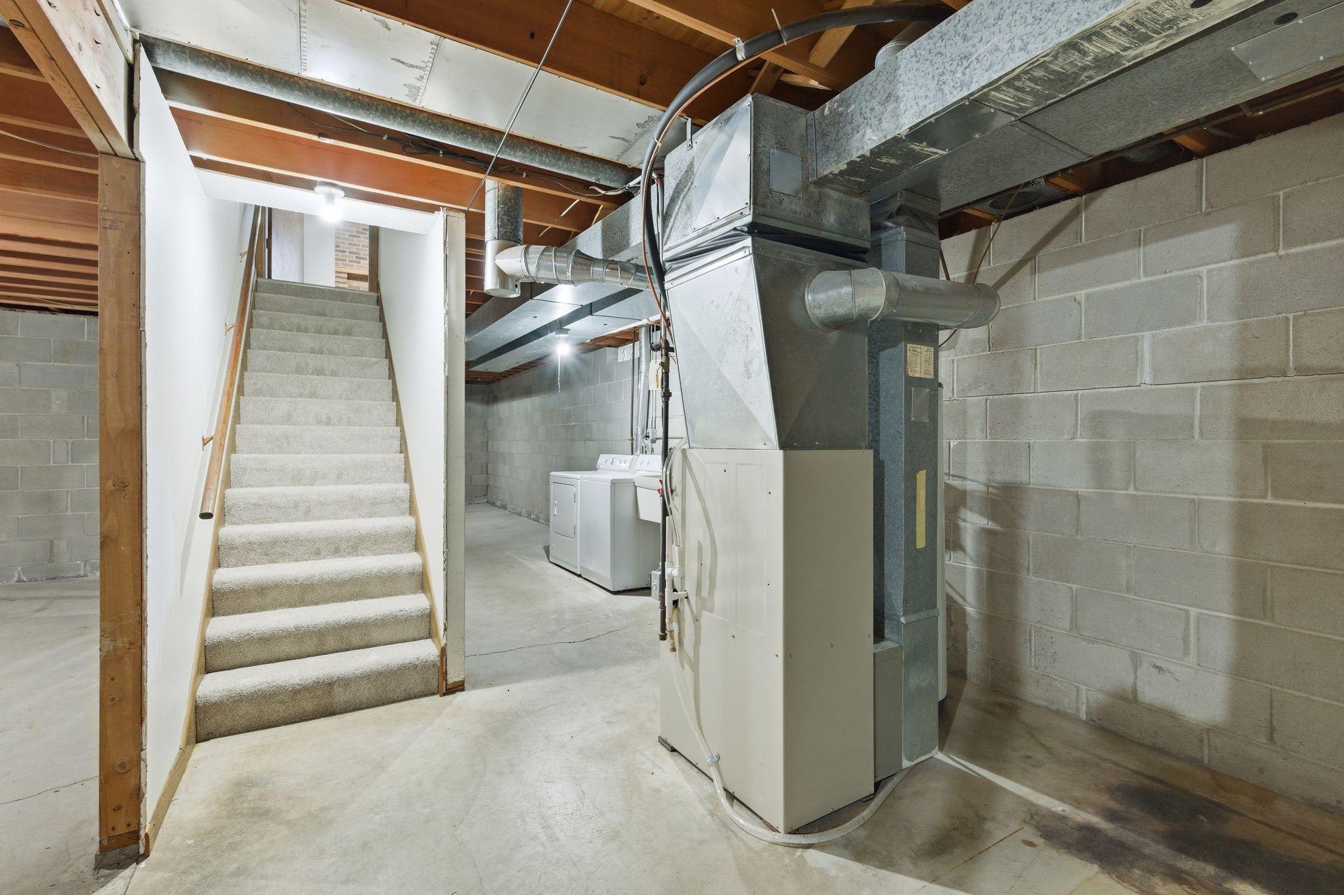 The stairs to basement have brand new carpet - a perfect start to lower level remodel and finish.