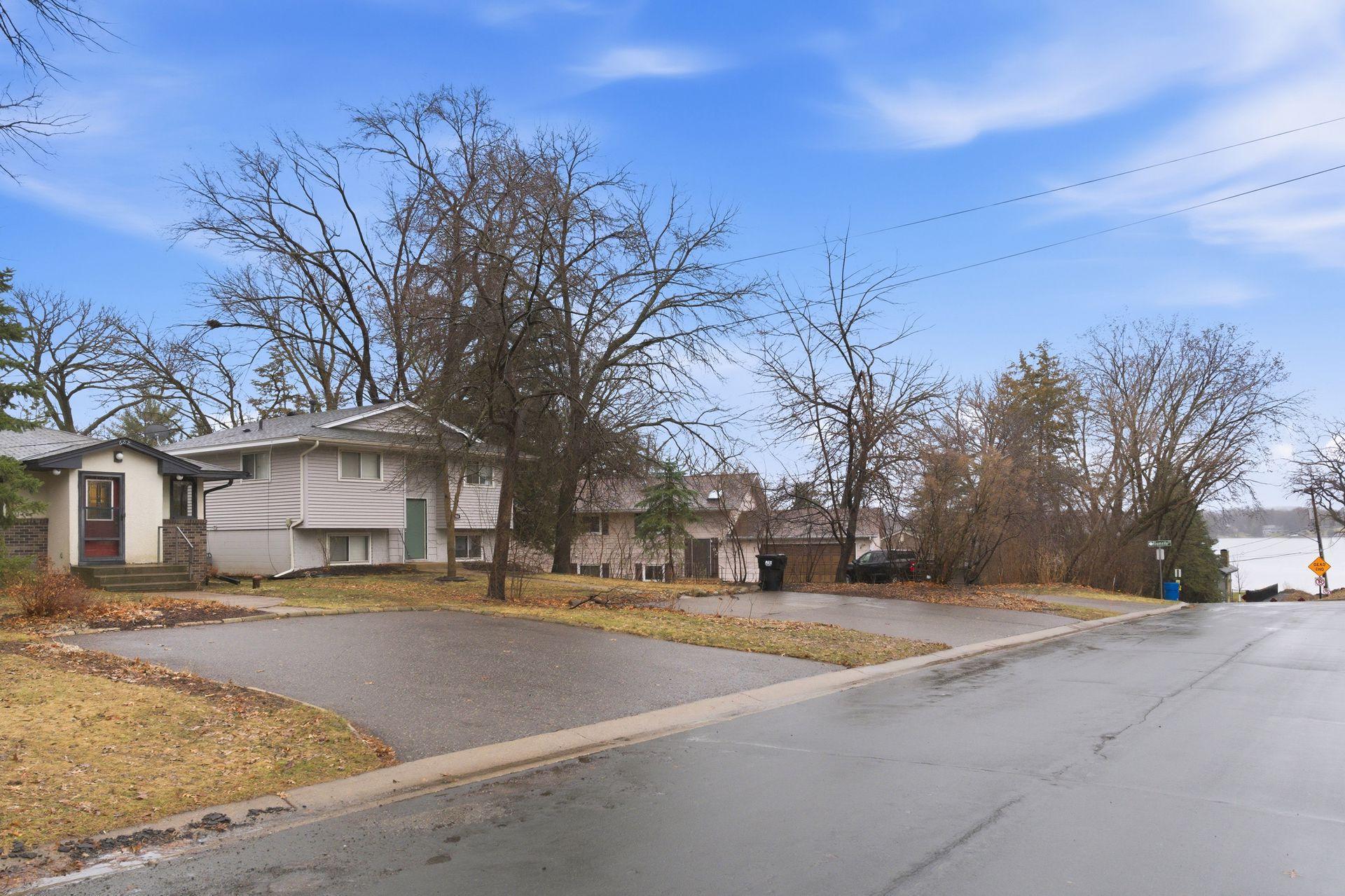 10+ LOCATION! Just steps from recreational Turtle Lake - beach & boat landing, MV schools - walk to Chippewa Middle School, easy access to grocery/shops and Hwy 96. Large front parking pad AND a rear 2 car garage on a no outlet alley.