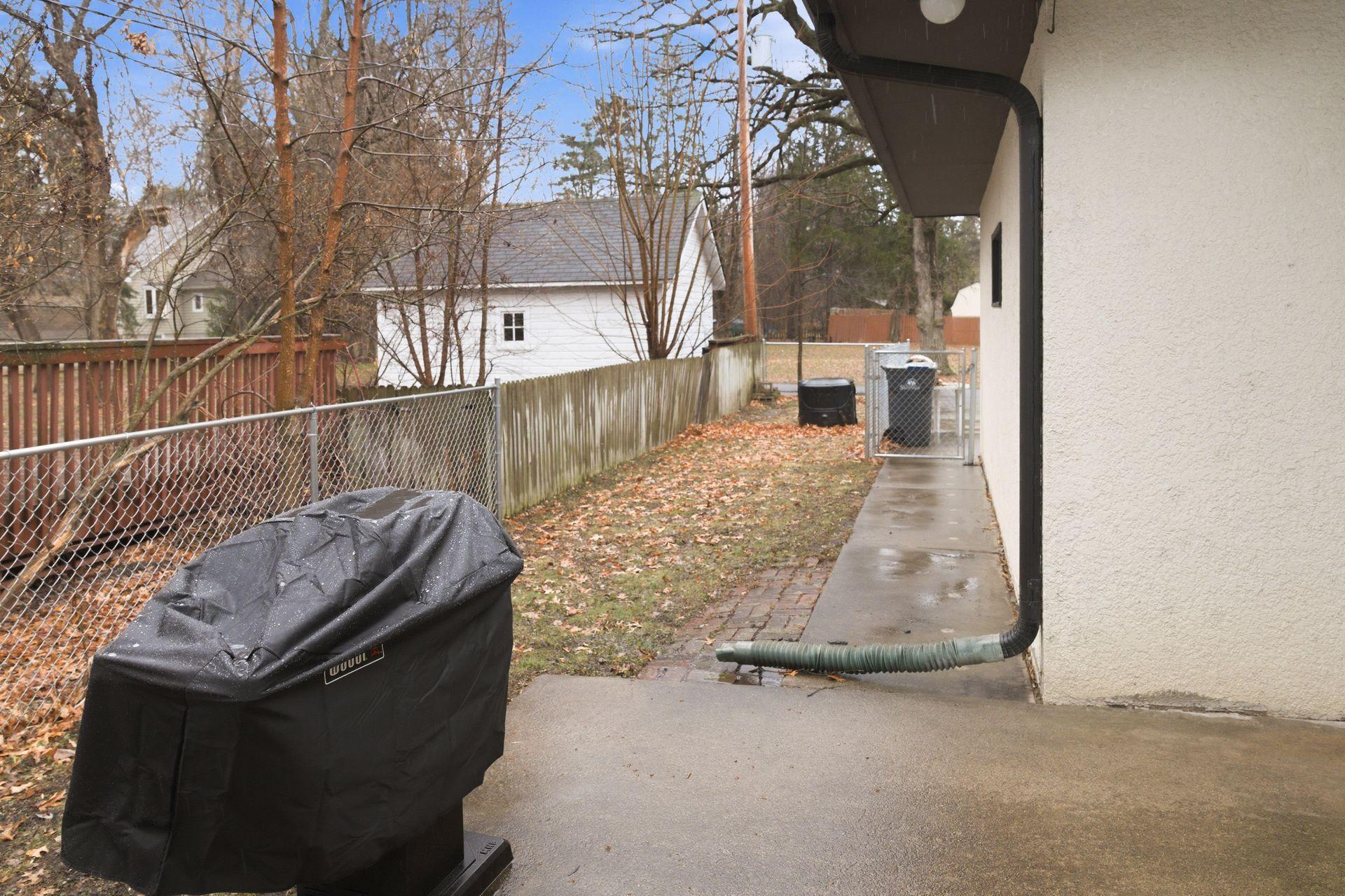 The east side of the backyard is fenced in.