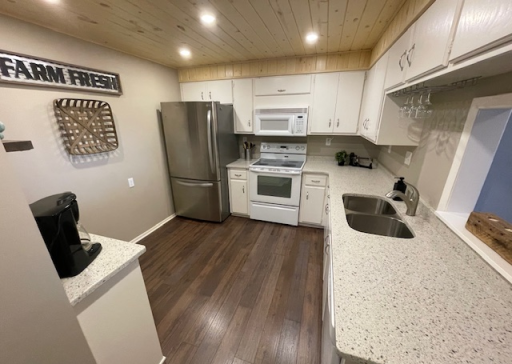 Served by the kitchen with its quartz countertops and