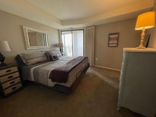 The comfortable second bedroom could also serve as an office, and...