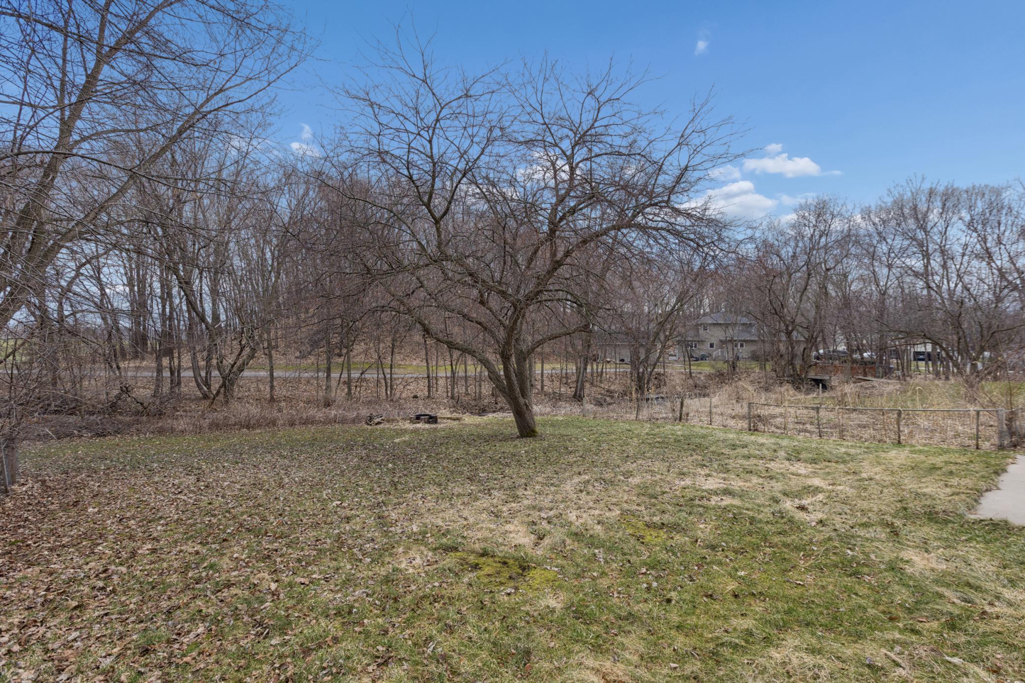 Mini orchard including mature fruit producing pear, apricot, chokecherry and honey crisp apples. Move in and enjoy this year's crops.