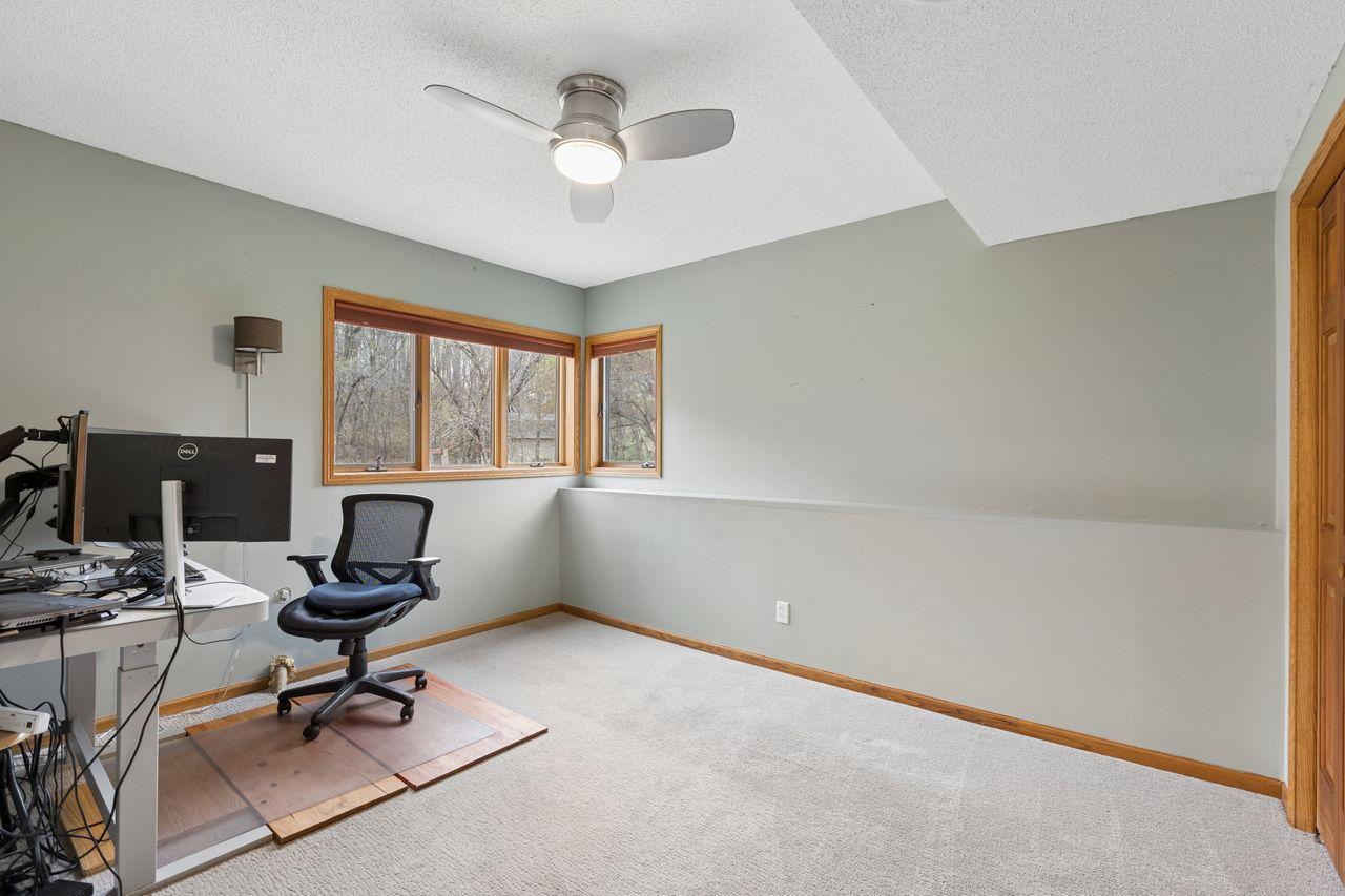 Windows to the rear yard with a nice treed view