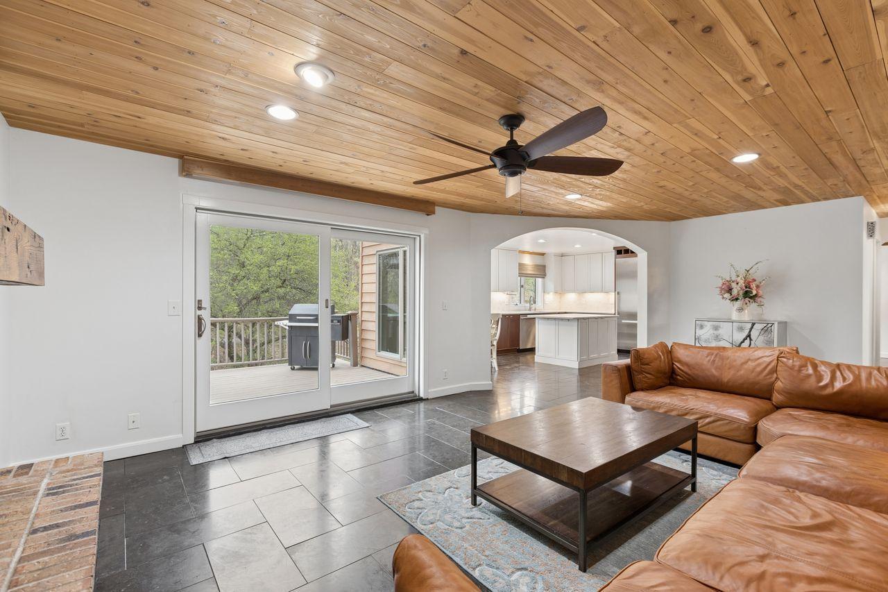 Full wall-Sliding patio doors flood the room with natural light