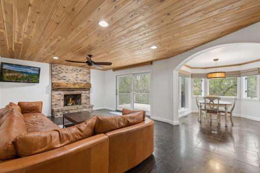 Brick surround gas fireplace that serves as a natural focal point for everyday living and entertaining.