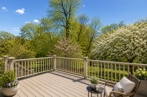 Virtual staged-Huge deck overlooking the orchard and private back yard, complete with solar lighting