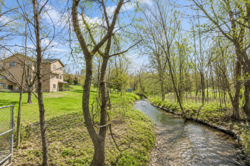 Virtual staged to enhance Rambling Creek in the backyard!