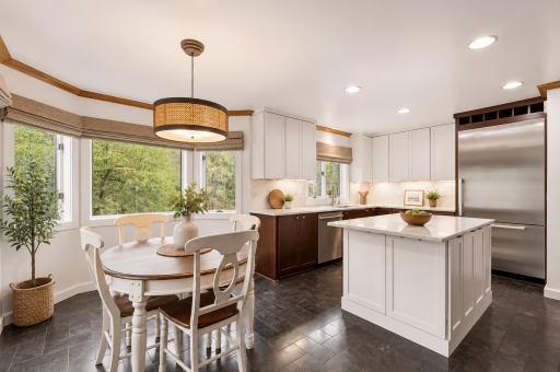Virtual staged-A plethora of white cabinets and recessed lighting