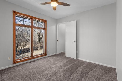 Large bedroom with huge window