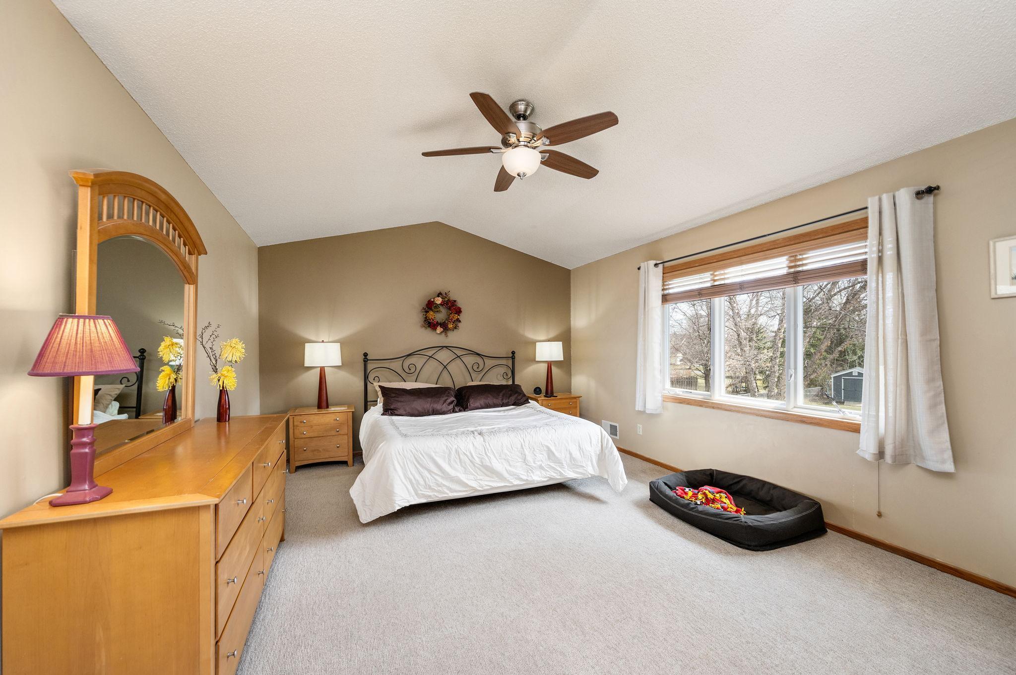 On one end of the upstairs is this massive owner's bedroom with wall of windows. Dog bed optional ;-)