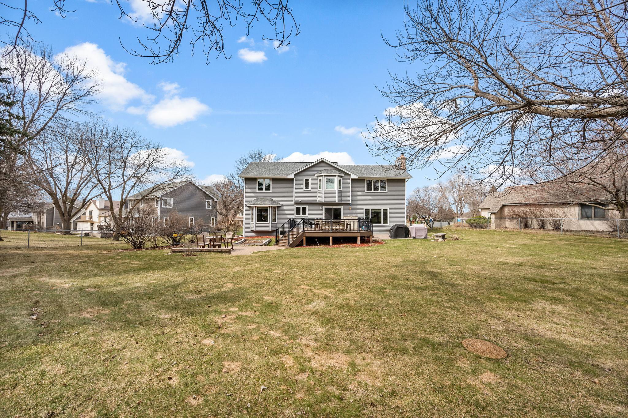Such an open and expansive back yard for all sorts of options depending upon your life style!