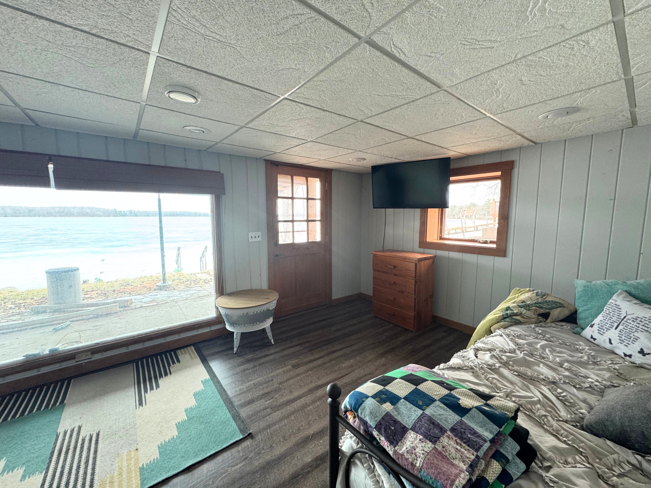 Family/bonus room with access to patio and lake.