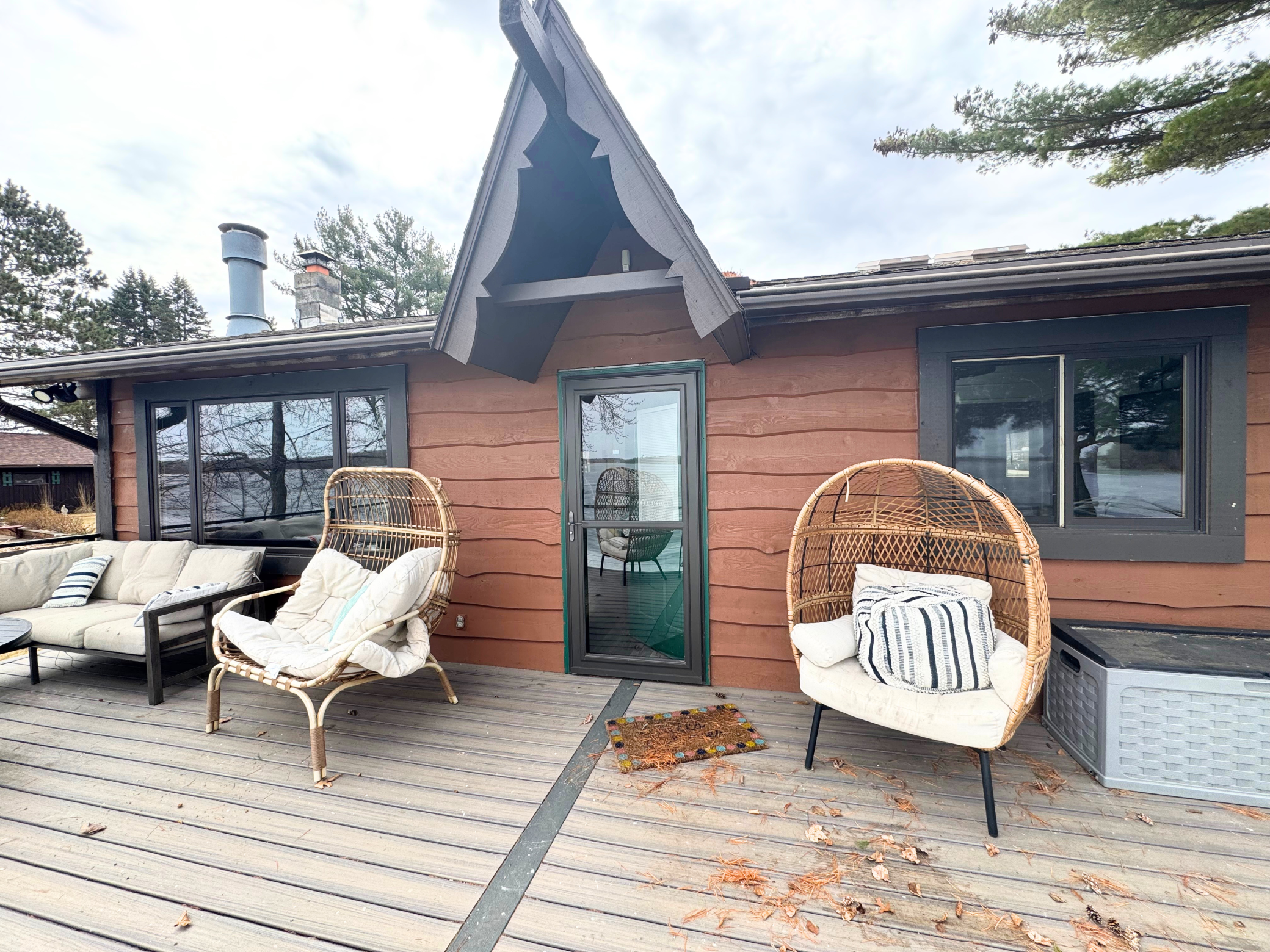 Lakeside deck with shoreline access.