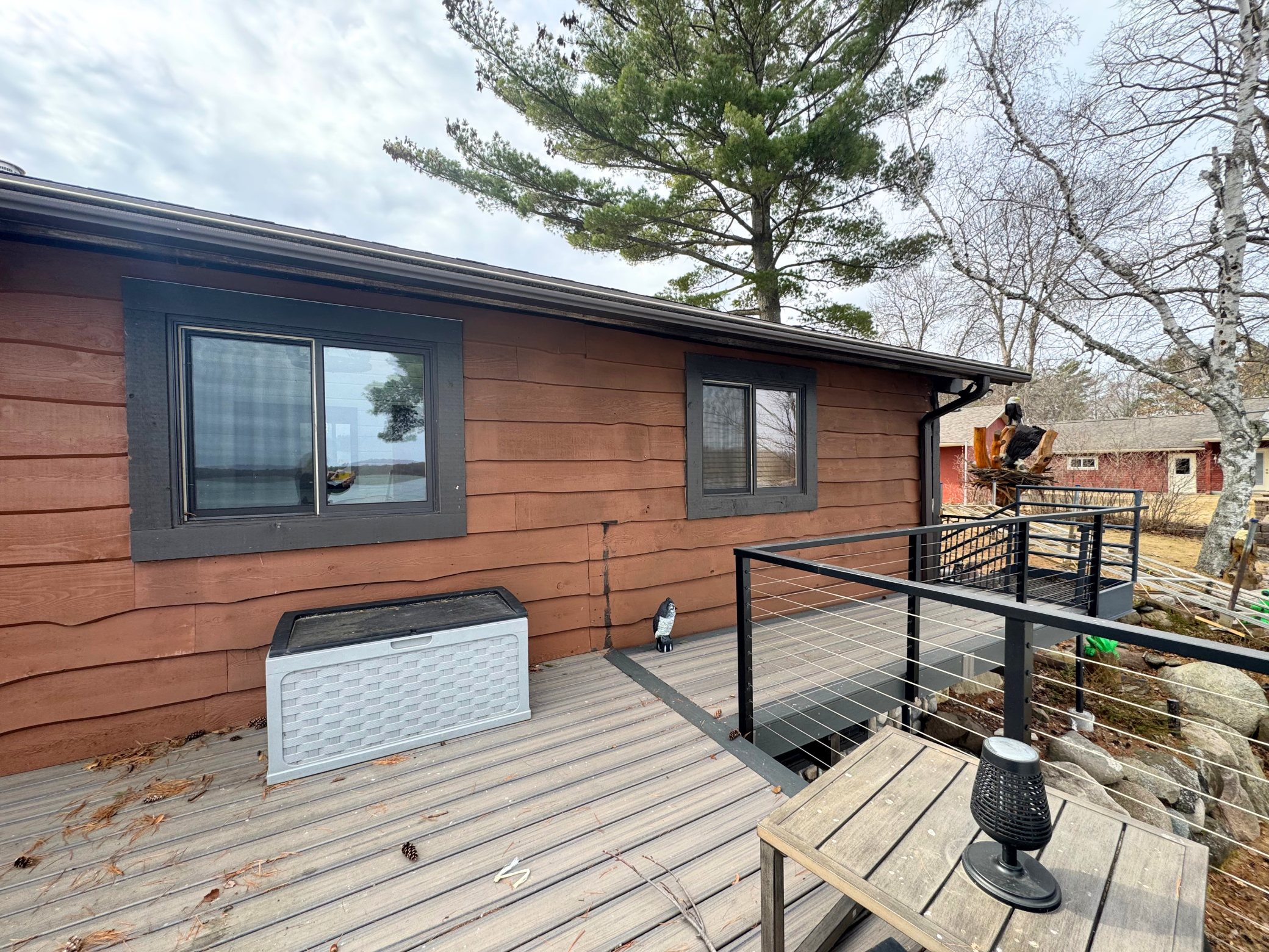 Lake side of property with maintenance free deck for panoramic views with a lasting impact!