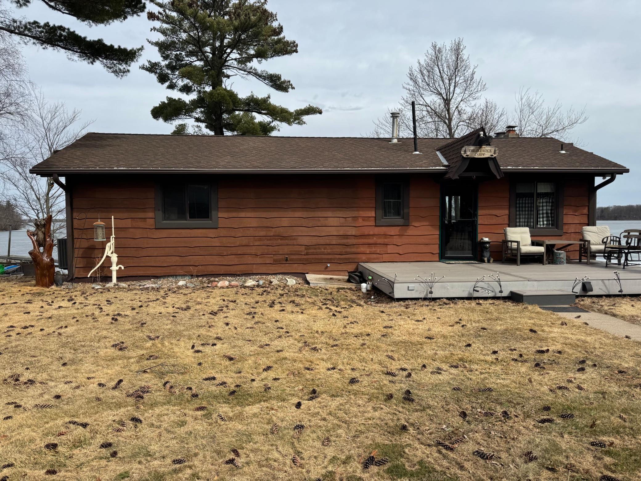 Front view of home with maintenance free front patio/entry.