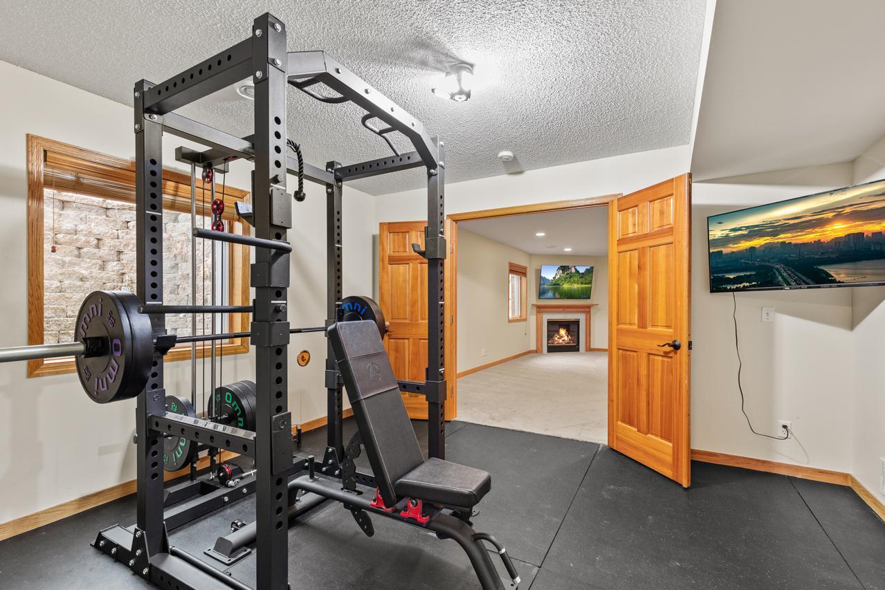 Bedroom 5 / Currently set up as an exercise room with rubber mat floor - includes an egress window