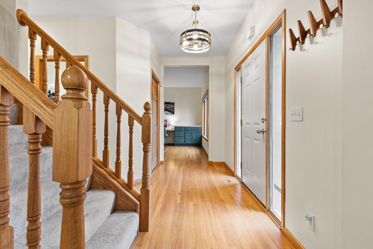 Foyer flows into front office / living room