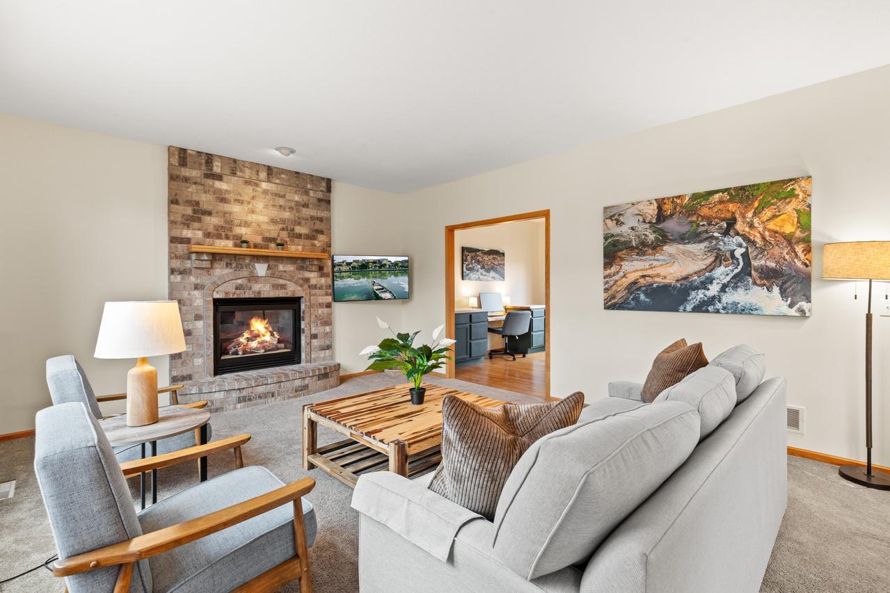 Living room opens up to front office / sitting room