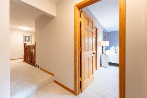 Upstairs offers three bedrooms with generous closet space and a full bath.
