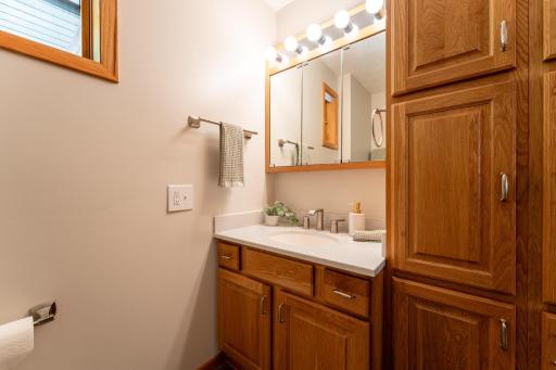 The second bathroom on the main level is a 3/4 bathroom with shower stall.