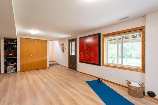 The walk-out lower level includes laundry, storage, another Â¾ bath, and flexible space ideal for a game room, hobby area, or additional recreation space.