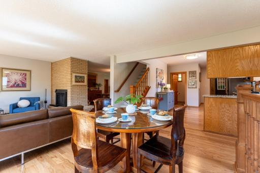 The main level features a spacious kitchen, dining room, living room with a two-sided gas fireplace, the primary suite with walk-through bath, plus an additional Â¾ bathroom.